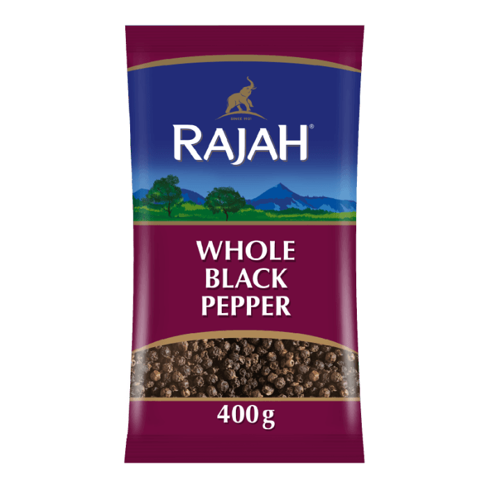 Whole black peppercorns image