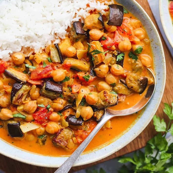 Grilled aubergines with spicy chickpeas & walnut sauce image